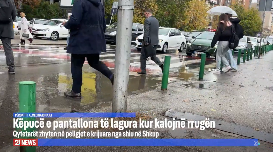 Këpucë e pantallona të lagura kur kalojnë rrugën  Qytetarët zhyten në pellgjet e krijuara nga shiu në Shkup